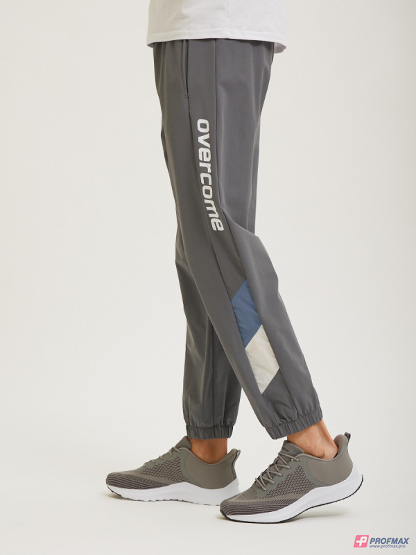 Серые спортивные брюки Overcome с контрастными вставками